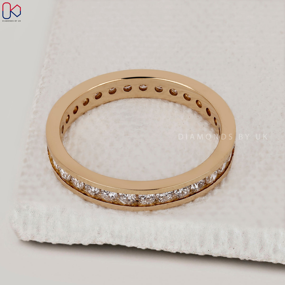 Yellow Gold Channel Set Round Diamond Band