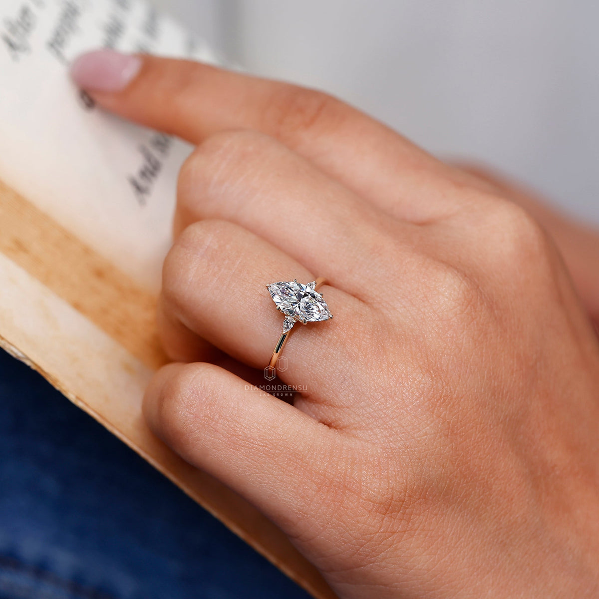 Marquise and Pear Cut Three Stone Engagement Ring