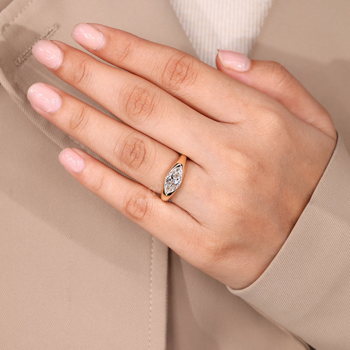 Marquise Cut Engagement Ring in Gypsy Setting