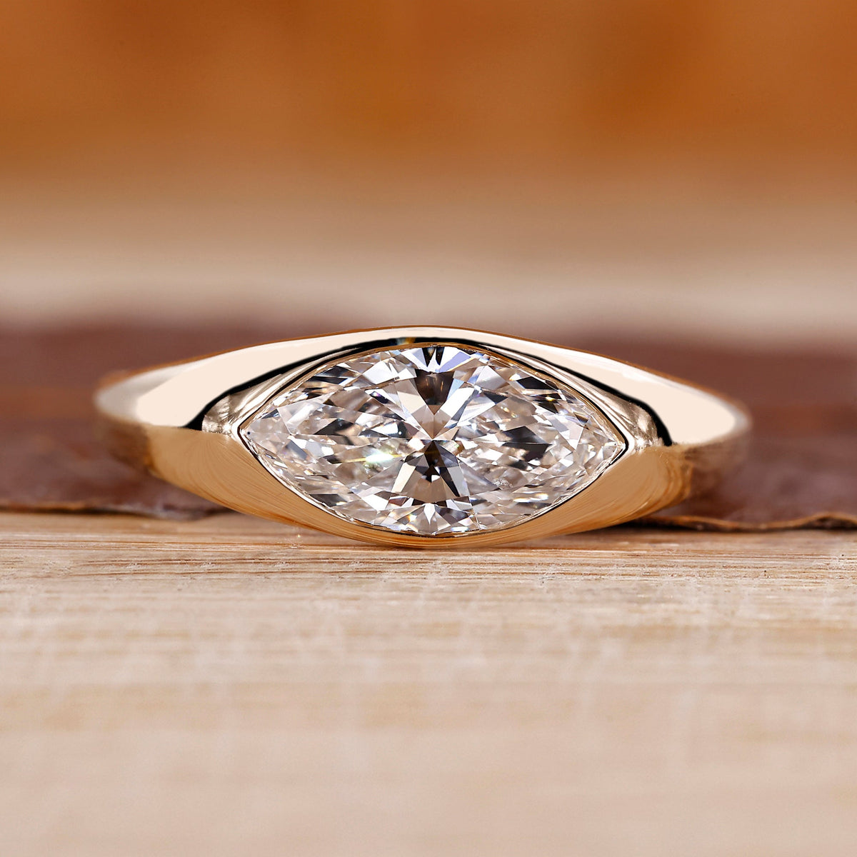 Marquise Cut Engagement Ring in Gypsy Setting