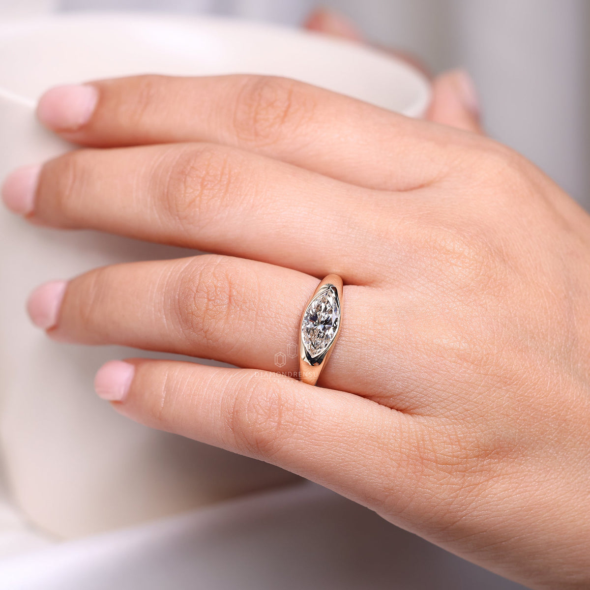 Marquise Cut Engagement Ring in Gypsy Setting