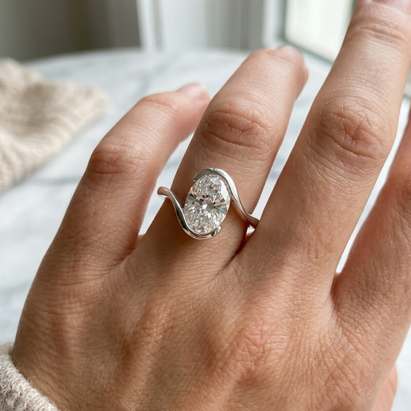 Minimalist Half-Bezel Solitaire Bypass Oval Cut Moissanite Engagement Ring