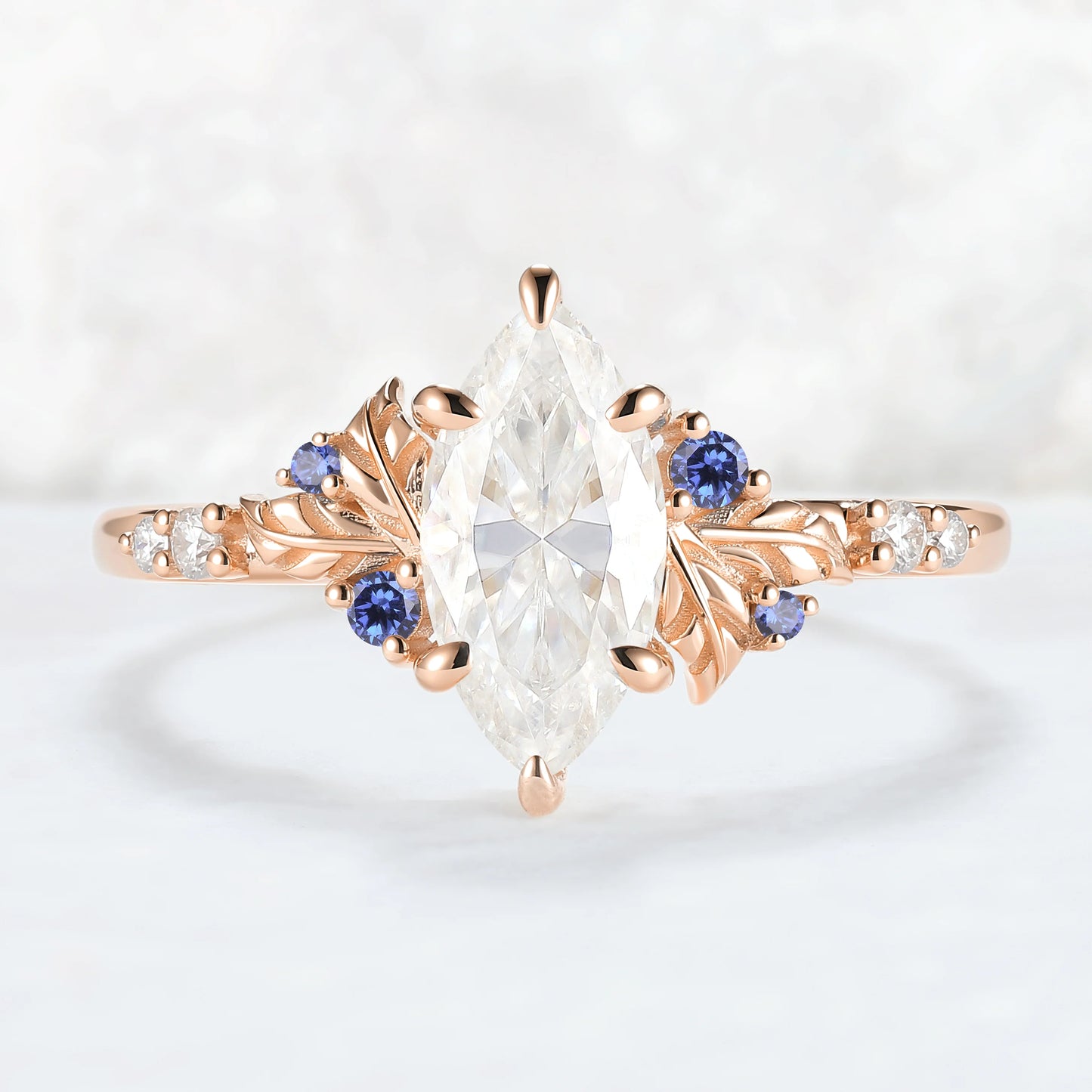 Nature Inspired Leaf Claw Inlay Marquise Cut Moissanite Gemstone Ring
