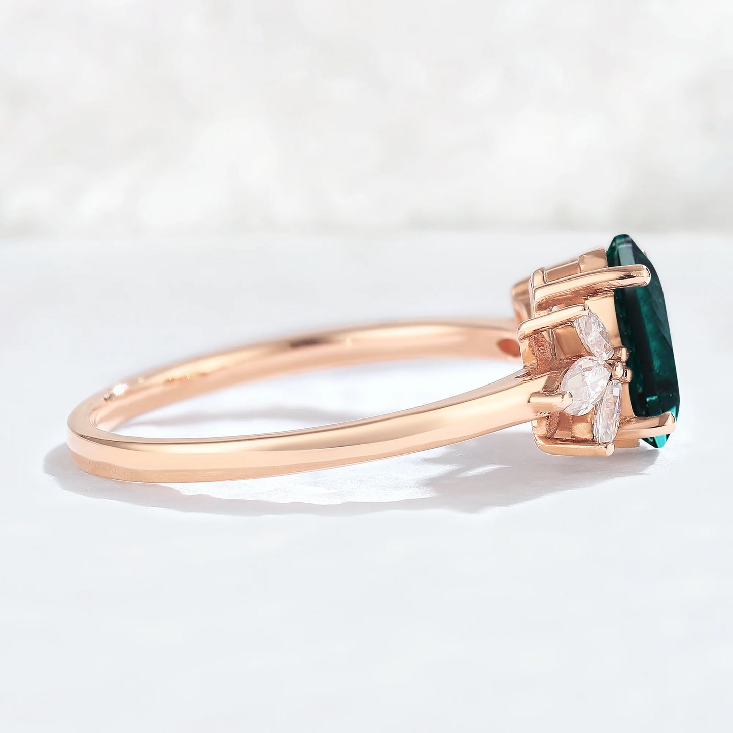 Nature Inspired Pear Cut Emerald with Petal Side Gemstone Ring