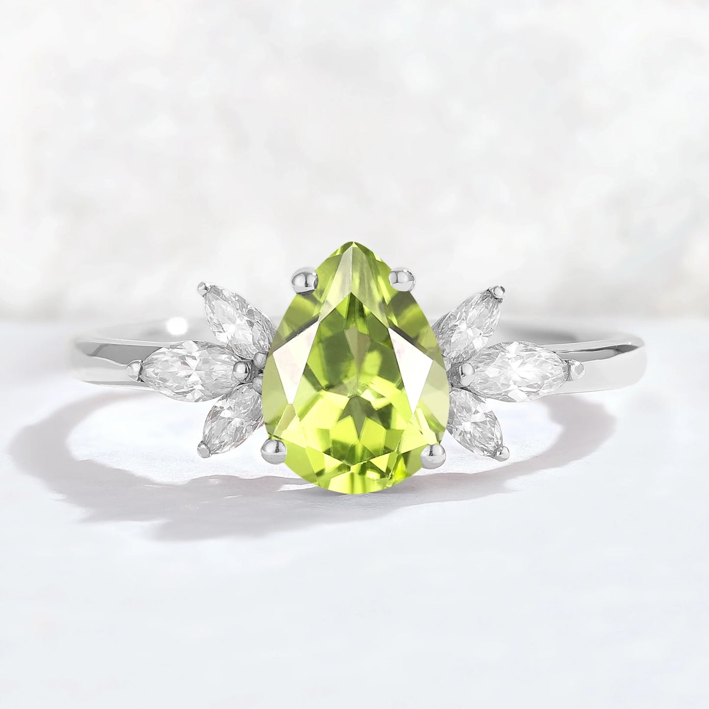 Nature Inspired Pear Cut Peridot with Petal Side Gemstone Ring