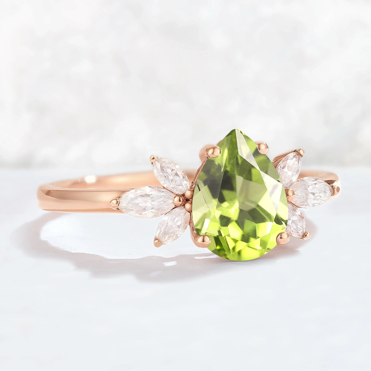 Nature Inspired Pear Cut Peridot with Petal Side Gemstone Ring
