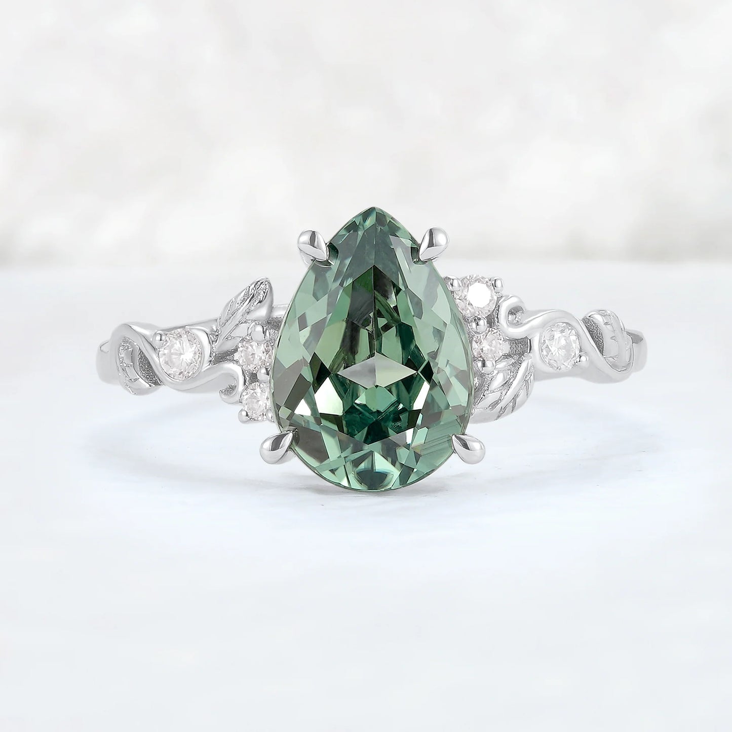 Nature Inspired Pear Cut Sapphire and Moissanite Silver Gemstone Ring