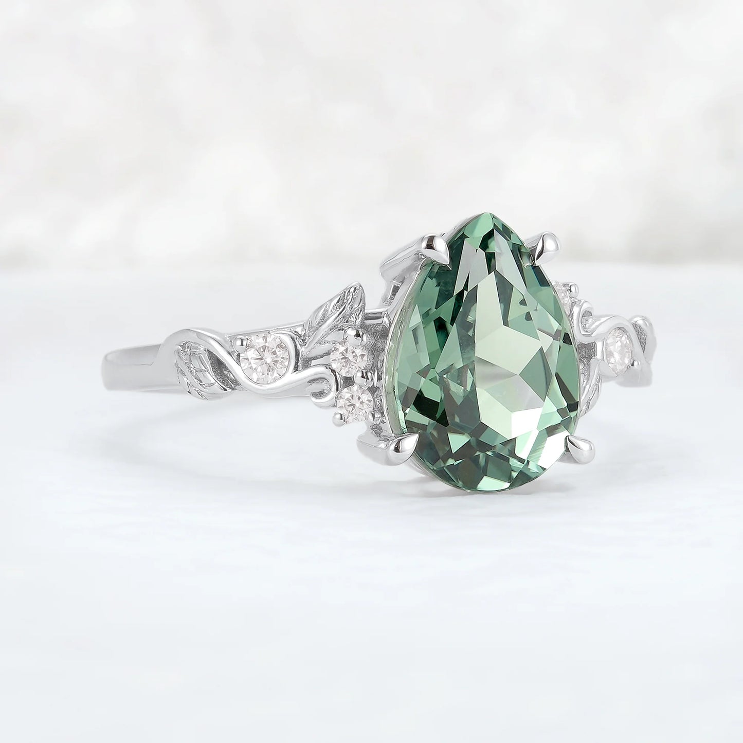 Nature Inspired Pear Cut Sapphire and Moissanite Silver Gemstone Ring