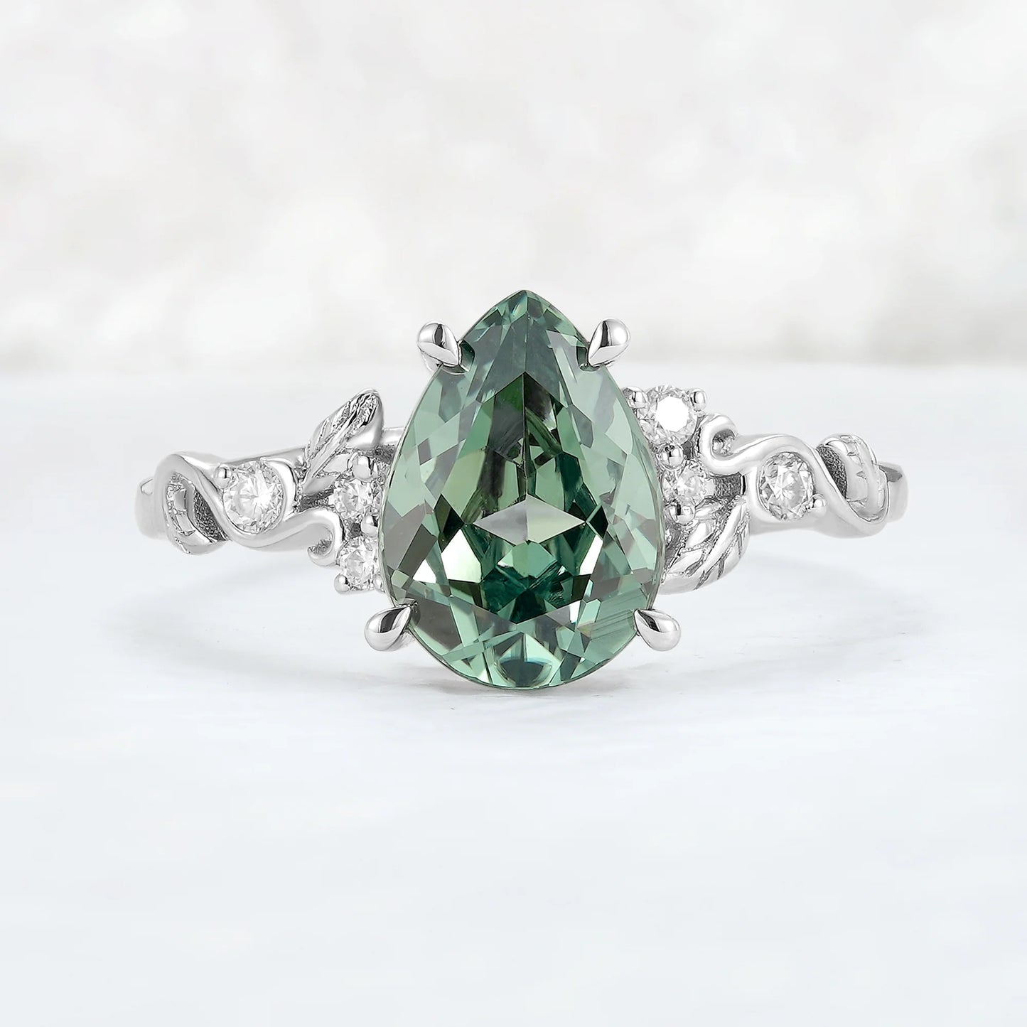 Nature Inspired Pear Cut Sapphire and Moissanite Silver Gemstone Ring