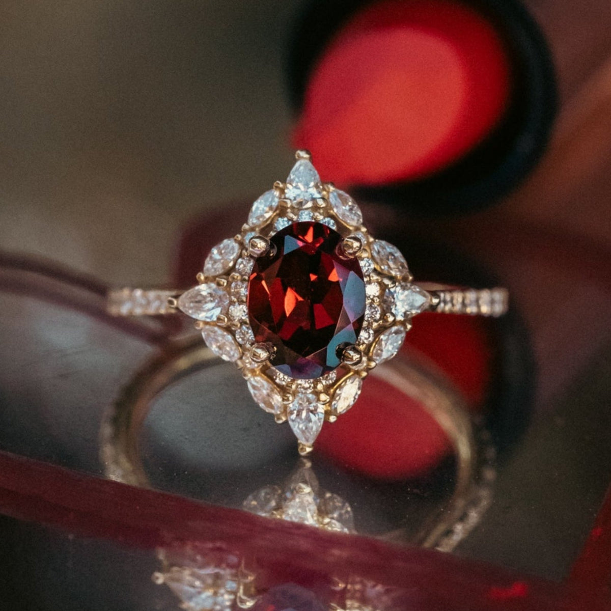 "North Star" - Oval Garnet Engagement Ring With Diamond Halo & Accents