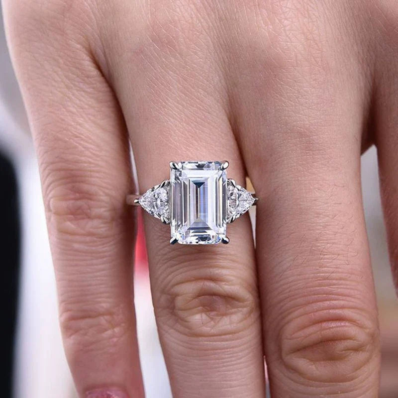 Deluxe Emerald Cut 7.5ct Three Stone Engagement Ring In Sterling Silver