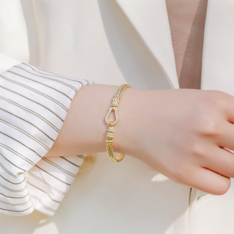 Gold Plated Sterling Silver Braided Bracelet with CZ Horseshoe Clasp