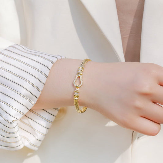 Gold Plated Sterling Silver Braided Bracelet with CZ Horseshoe Clasp