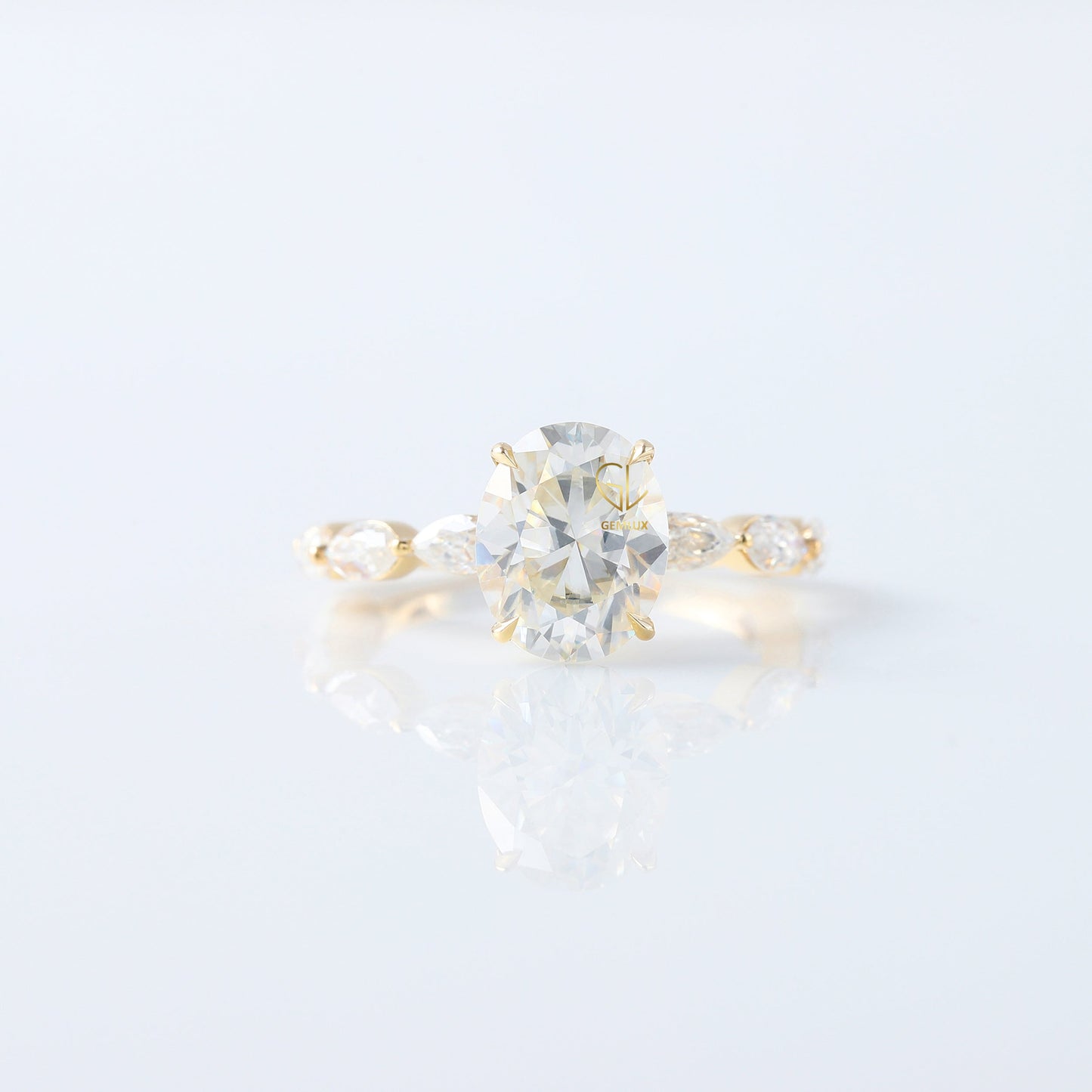 Oval Cut Moissanite Solitaire With Accent Ring