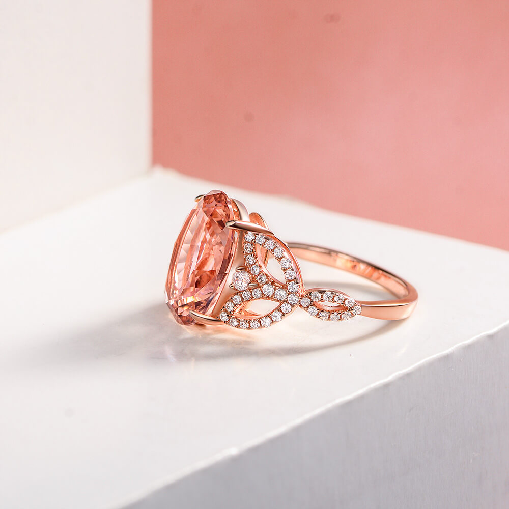 Oval Cut Pink Sapphire Leaf Accents Sterling Silver Ring