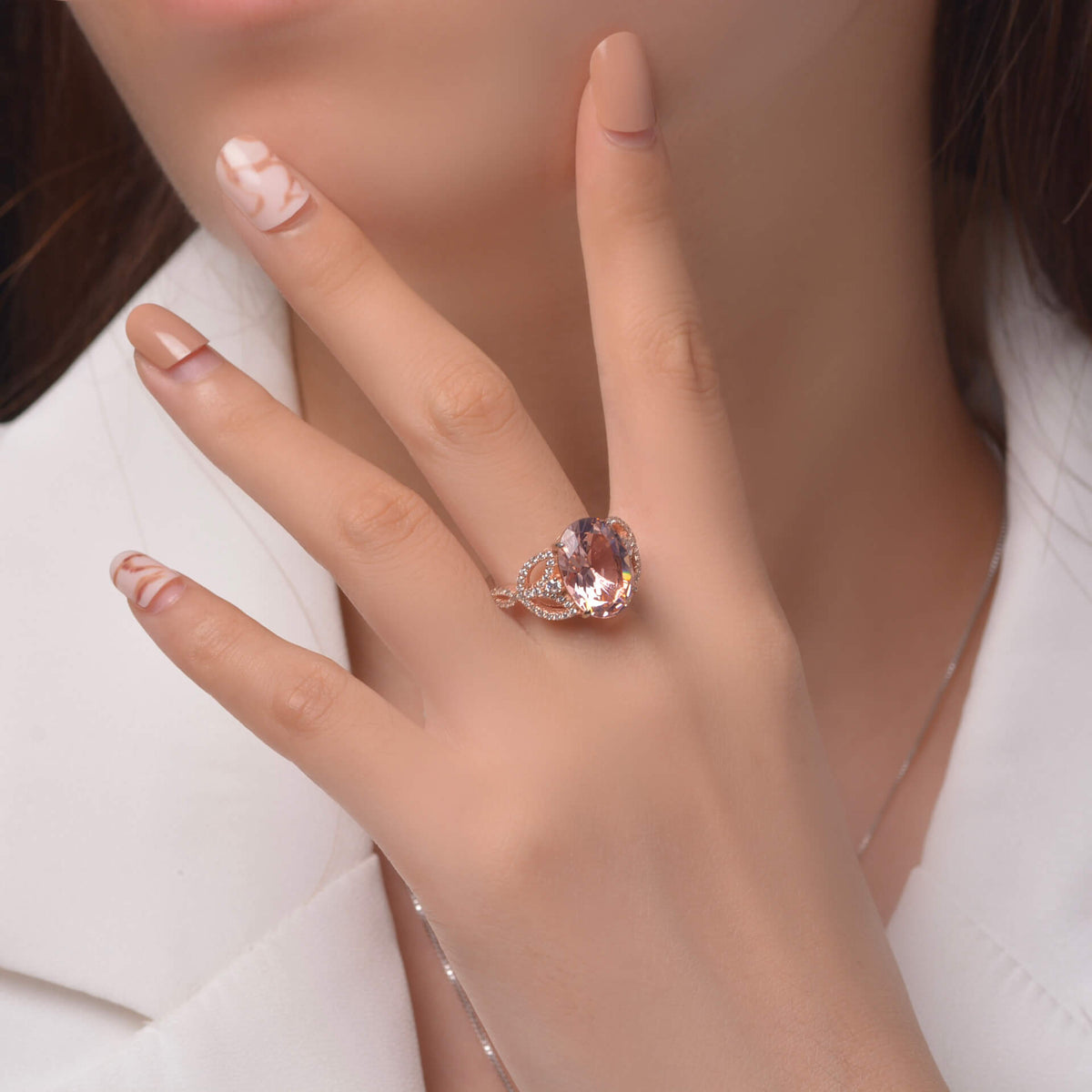Oval Cut Pink Sapphire Leaf Accents Sterling Silver Ring