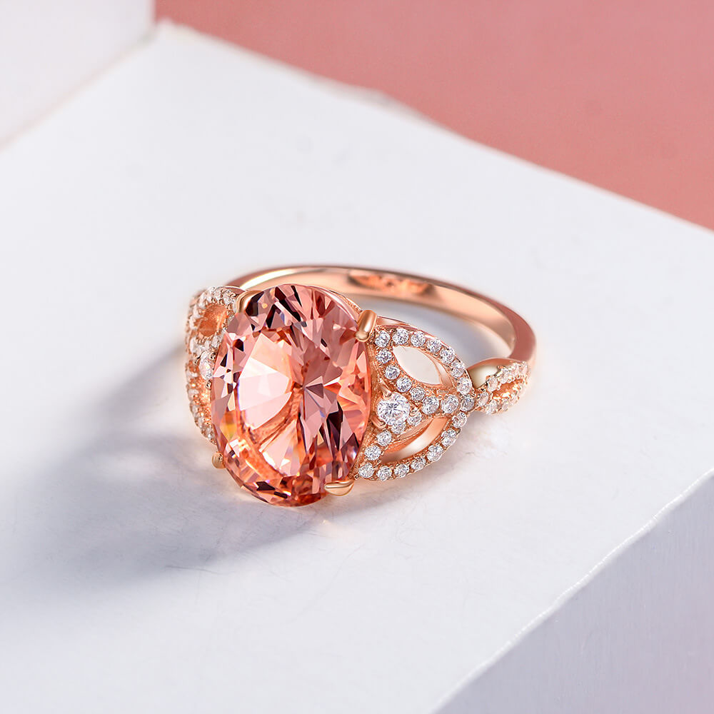 Oval Cut Pink Sapphire Leaf Accents Sterling Silver Ring