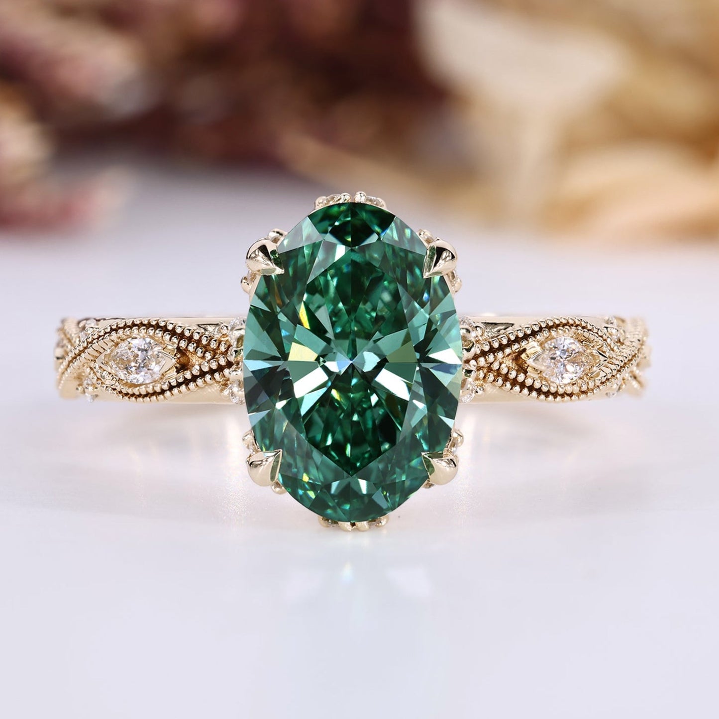 Green Oval Cut Diamond Ring with Marquise Outline Round Side Stones