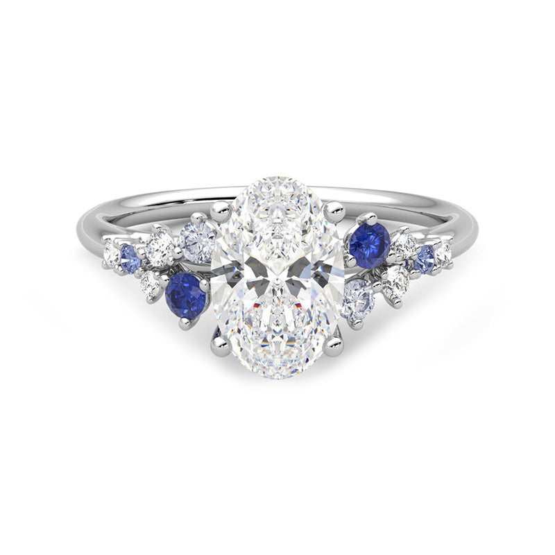 Oval Moissanite And Graduated Blue Sapphire Clusters Engagement Ring