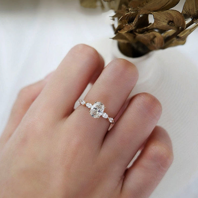 Oval Moissanite With Marquise Accents Engagement Ring