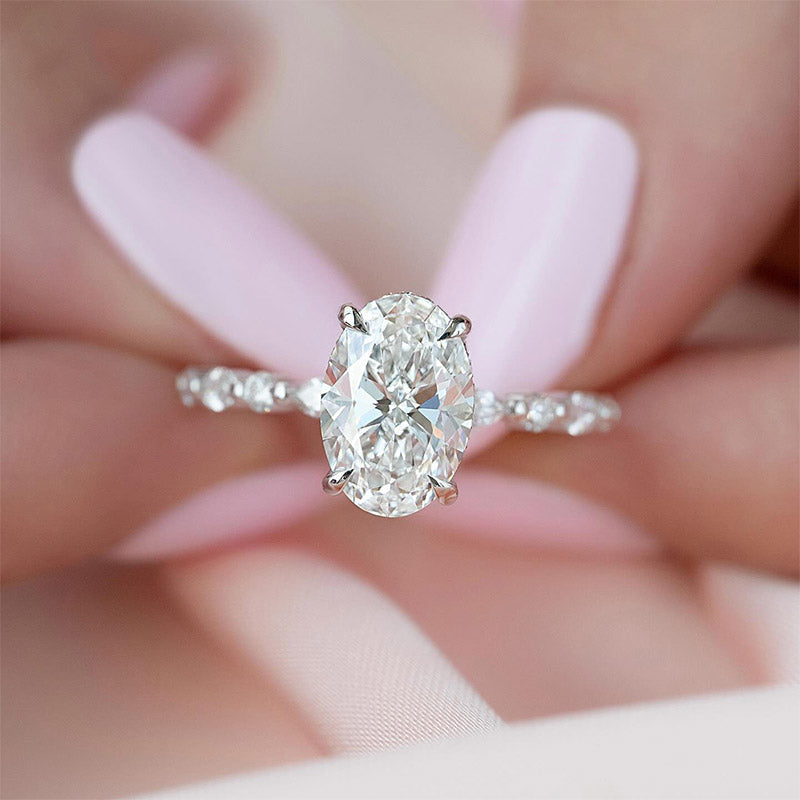 Oval Moissanite With Marquise Accents Engagement Ring