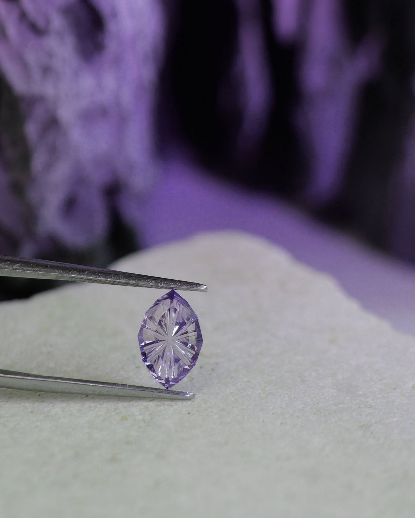 Tanzanite, Hortensia cut | natural, purplish lavender color, marquise-cut, 9.7x6.3mm, 1.12ct