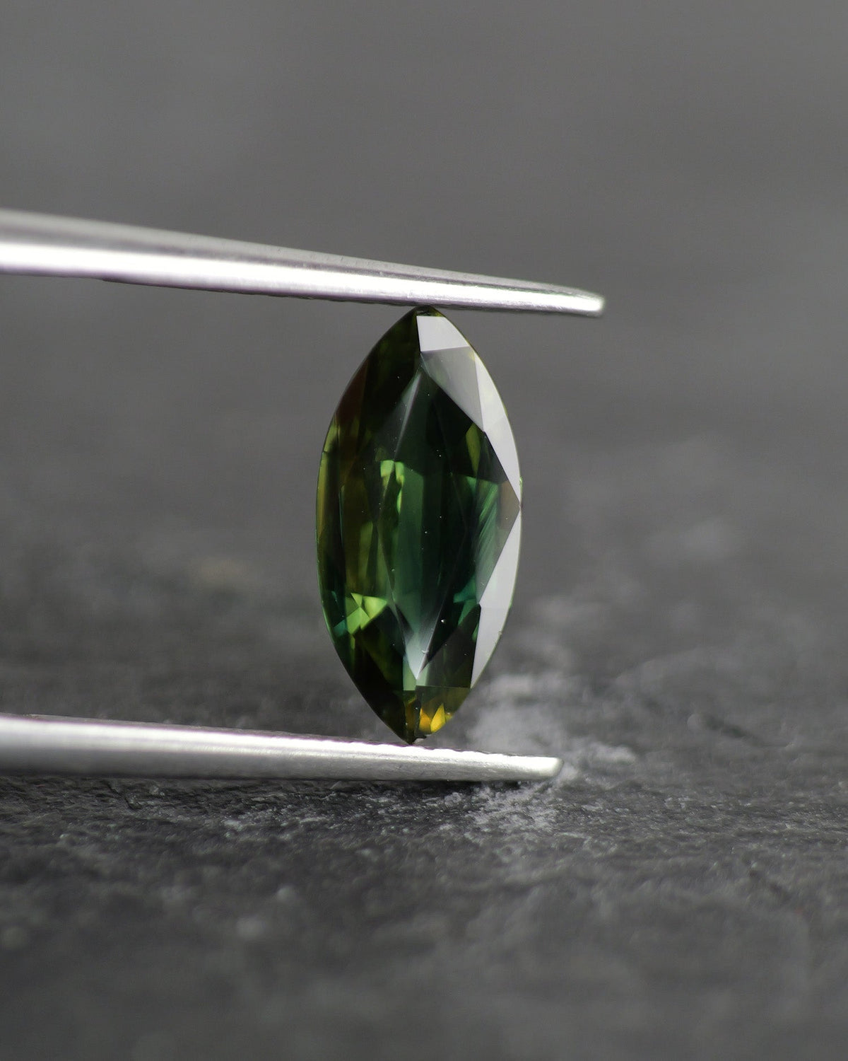 Sapphire | natural, green color changing, marquise-cut, 12x6mm, 1.65ct