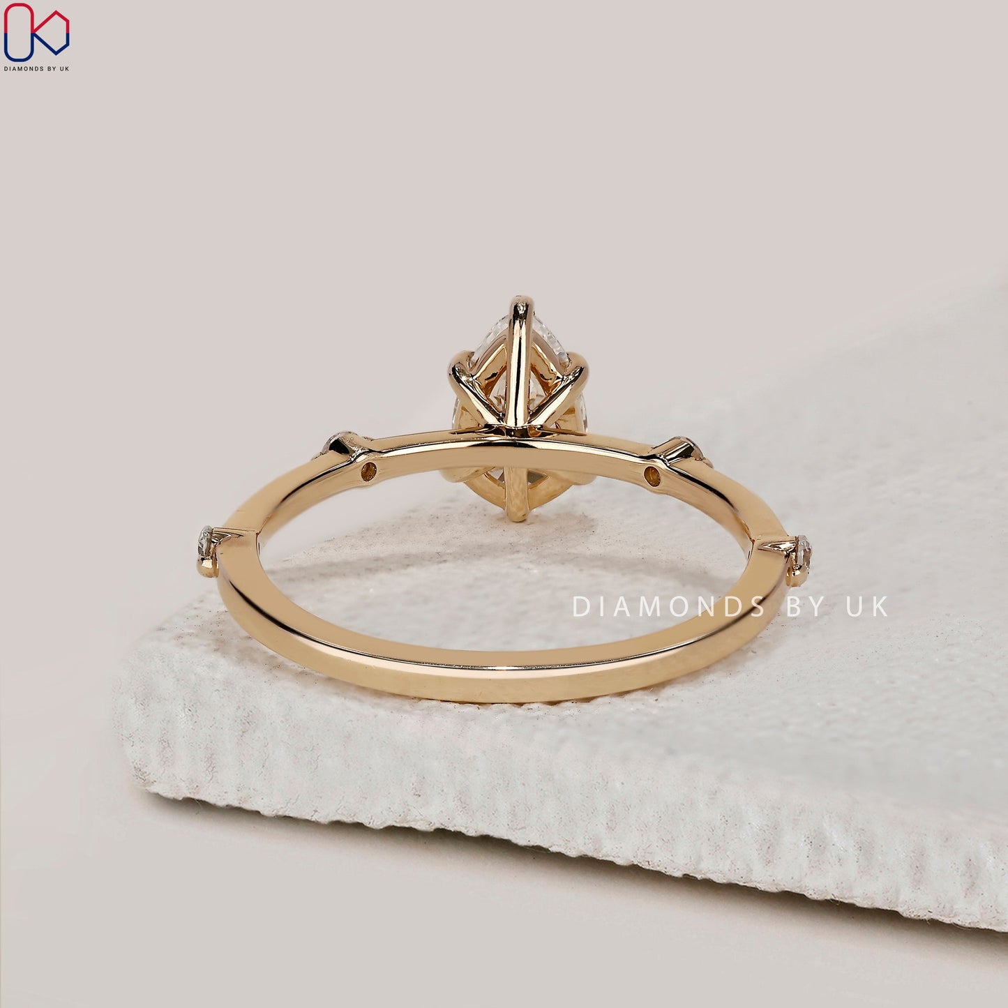 Pear Diamond Ring With Distance Pave Band