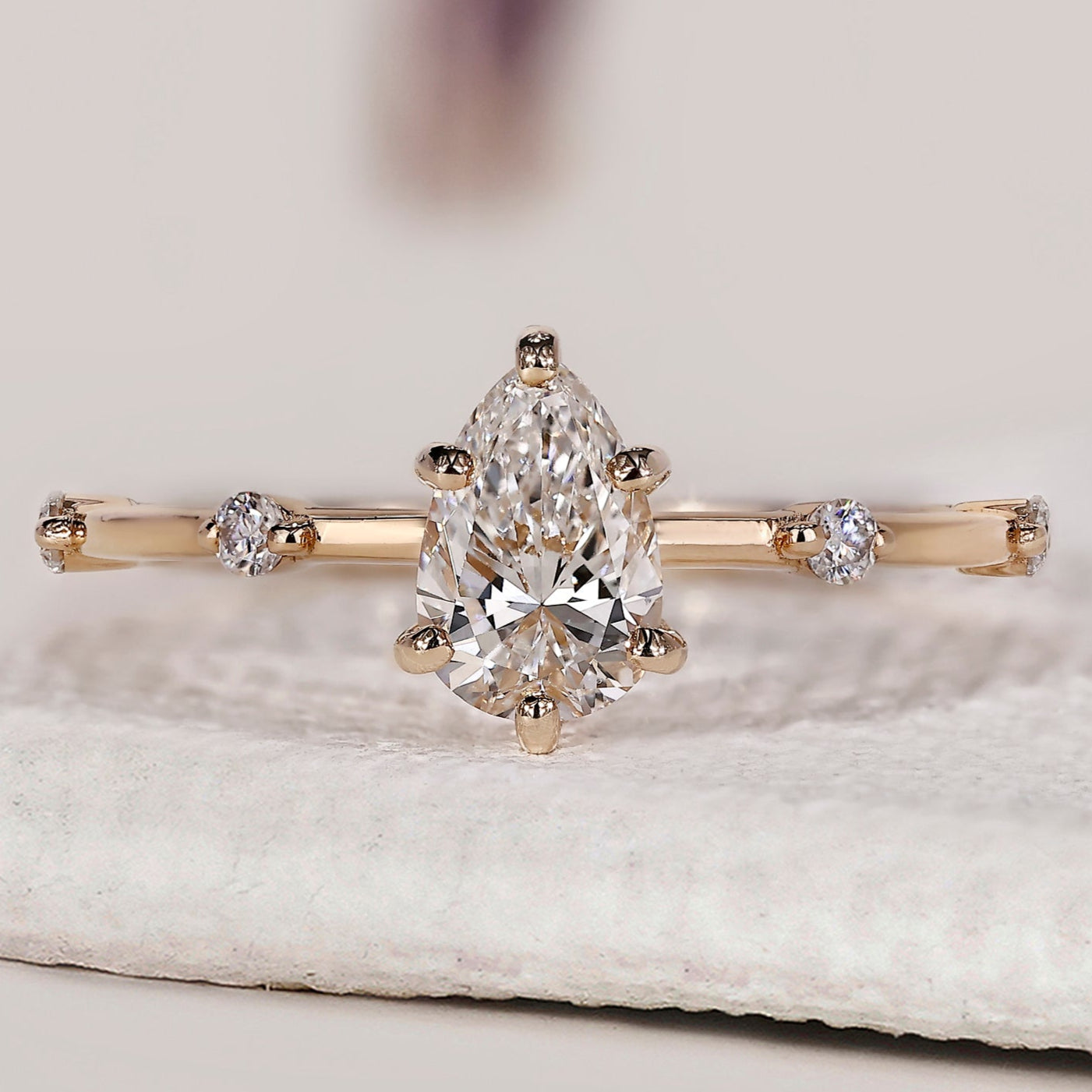 Pear Diamond Ring With Distance Pave Band