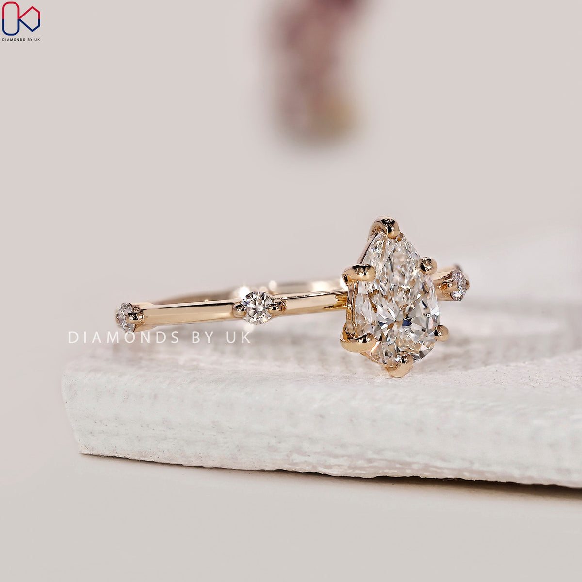 Pear Diamond Ring With Distance Pave Band