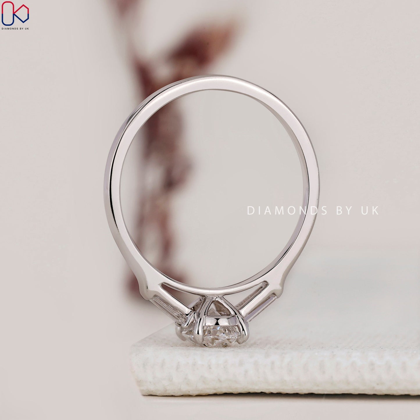 3 Stone Diamond Ring With Oval And Tapered Baguette Stone