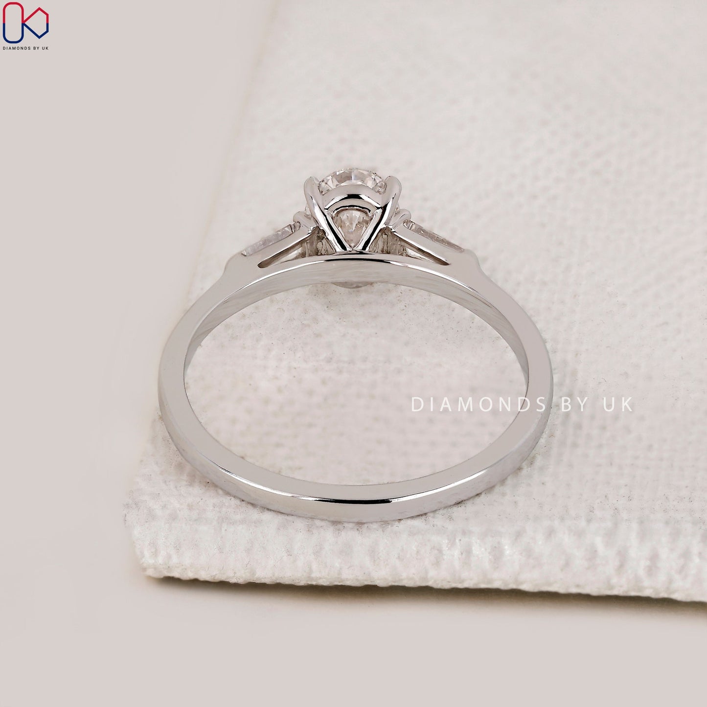 3 Stone Diamond Ring With Oval And Tapered Baguette Stone