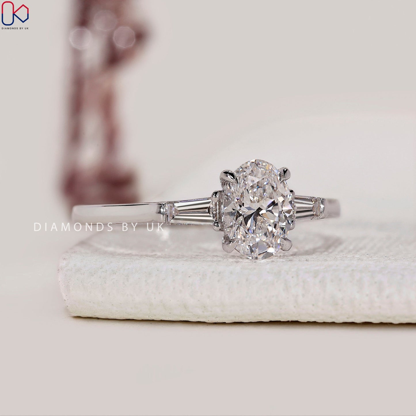 3 Stone Diamond Ring With Oval And Tapered Baguette Stone