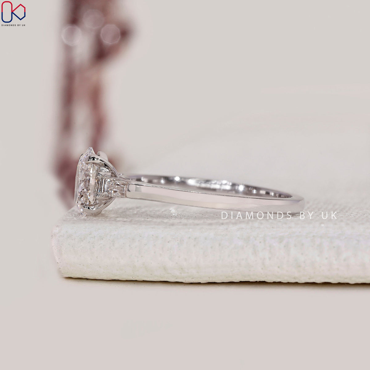 3 Stone Diamond Ring With Oval And Tapered Baguette Stone