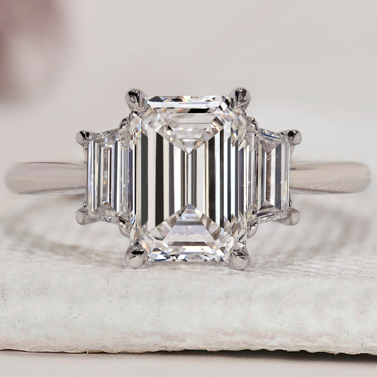 Emerald And Trapezoid Baguette 3 Stone Ring