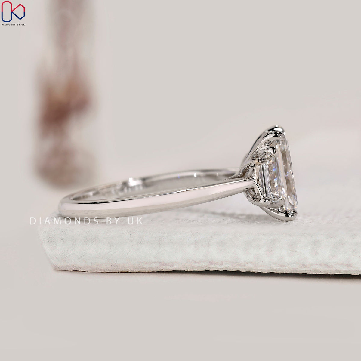 Emerald And Trapezoid Baguette 3 Stone Ring