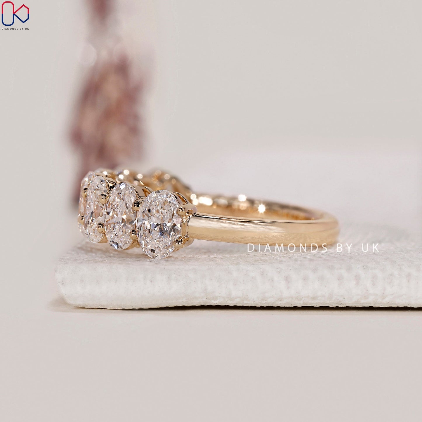 Half Eternity Oval Cut Diamond Band