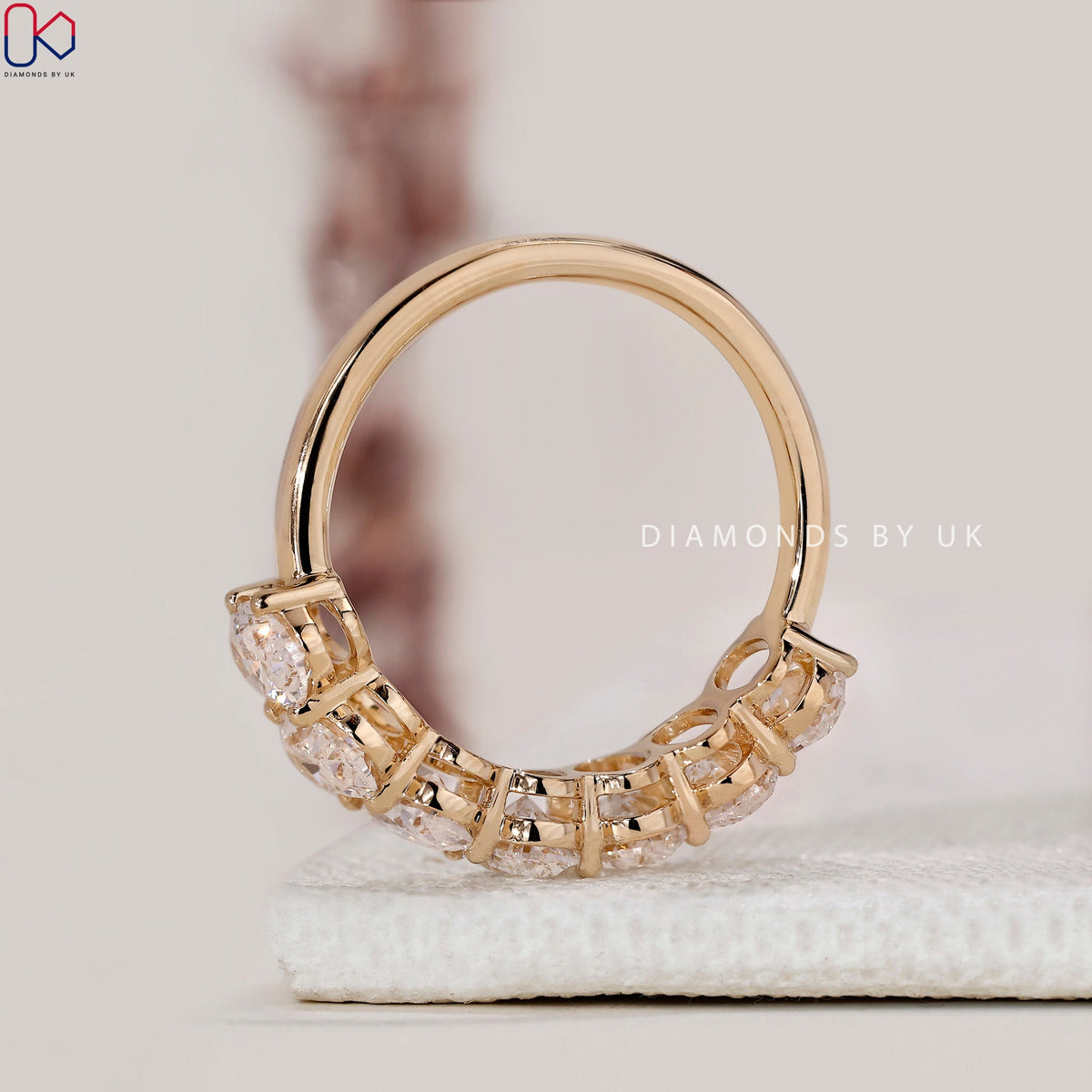 Half Eternity Oval Cut Diamond Band