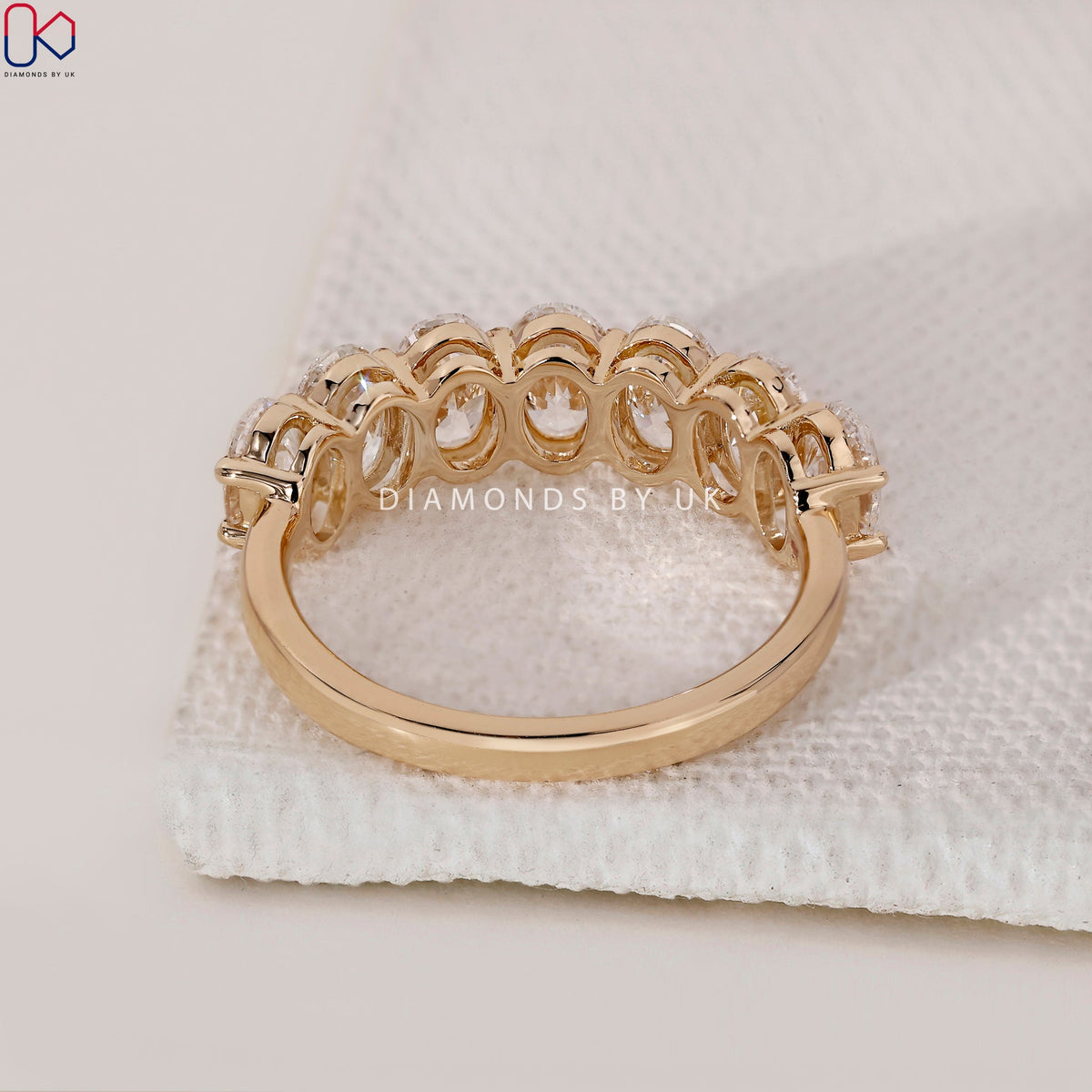Half Eternity Oval Cut Diamond Band