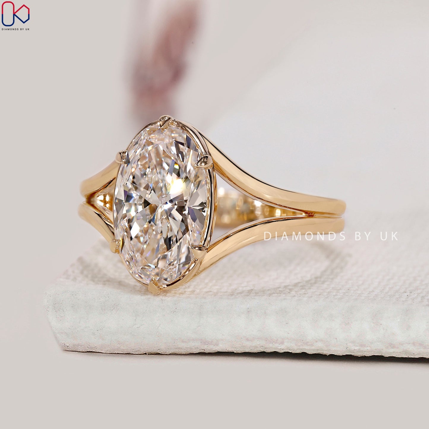 Oval Diamond Split Shank Engagement Ring