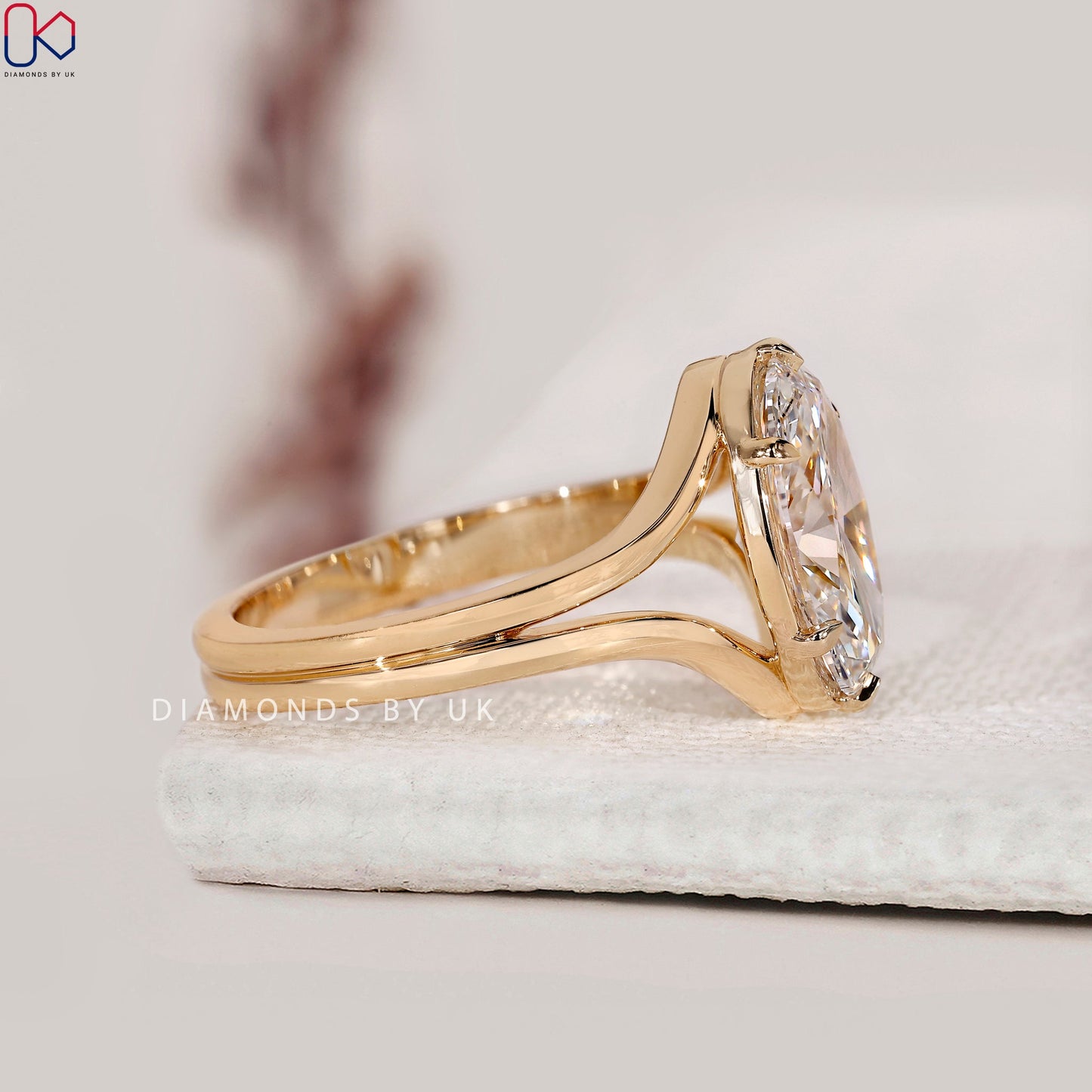 Oval Diamond Split Shank Engagement Ring
