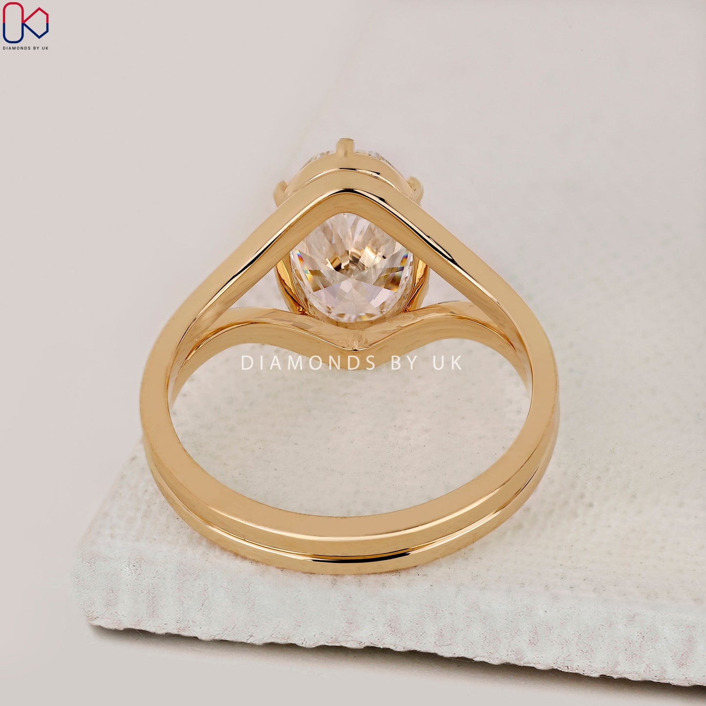 Oval Diamond Split Shank Engagement Ring