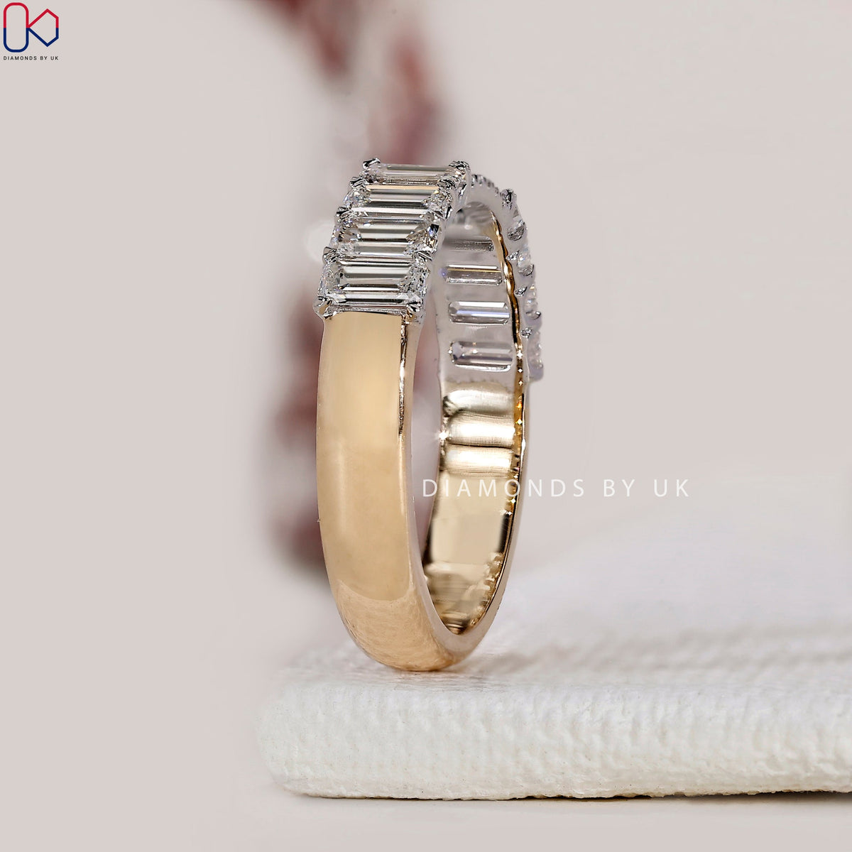 Emerald Cut Yellow And White Gold Wedding Band