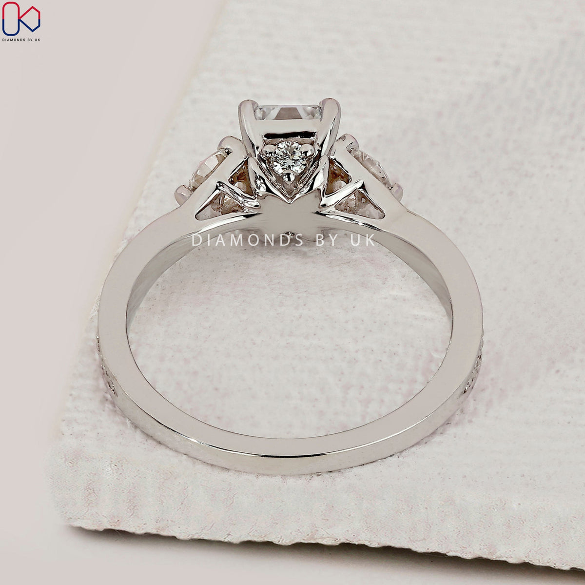 Emerald Cut Diamond Ring With Tapered Pave Band