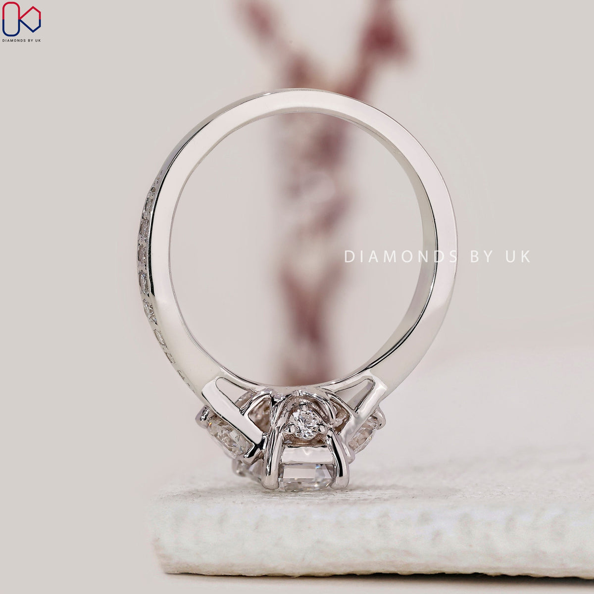 Emerald Cut Diamond Ring With Tapered Pave Band