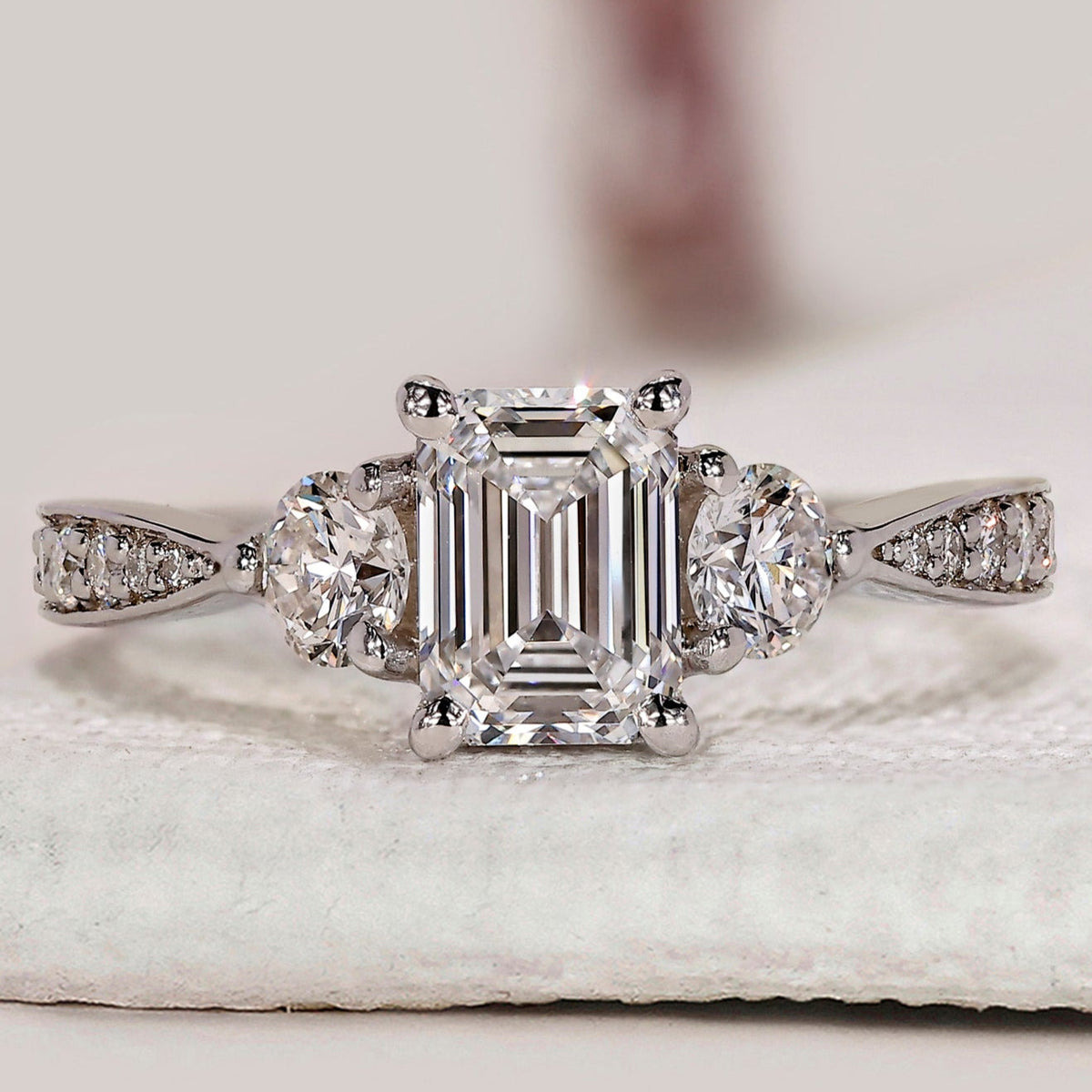 Emerald Cut Diamond Ring With Tapered Pave Band