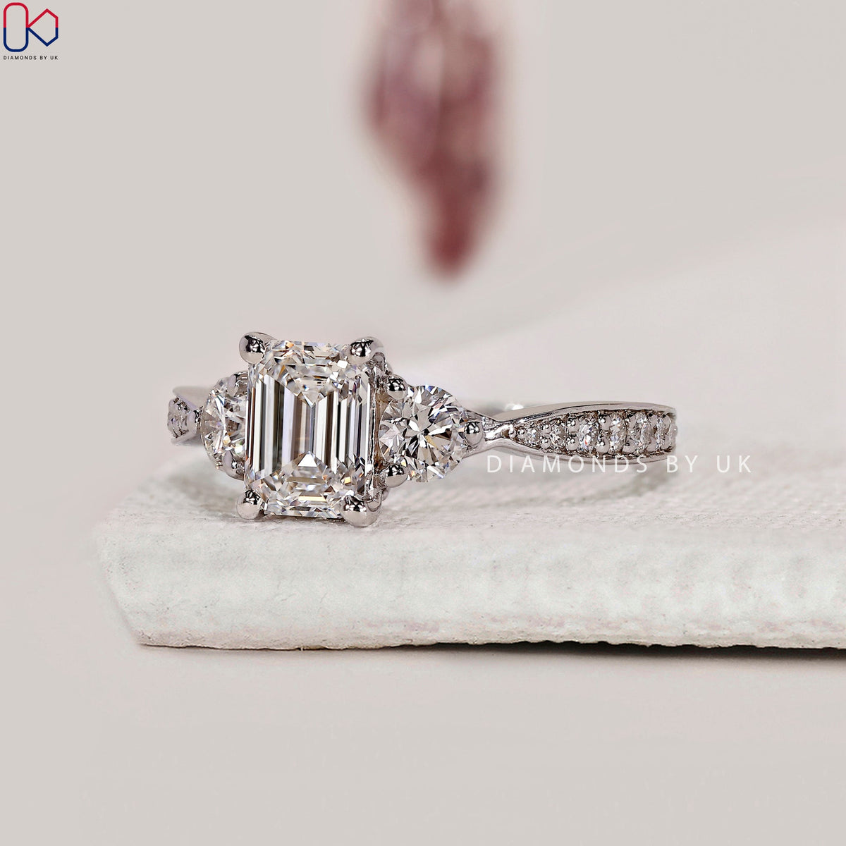 Emerald Cut Diamond Ring With Tapered Pave Band