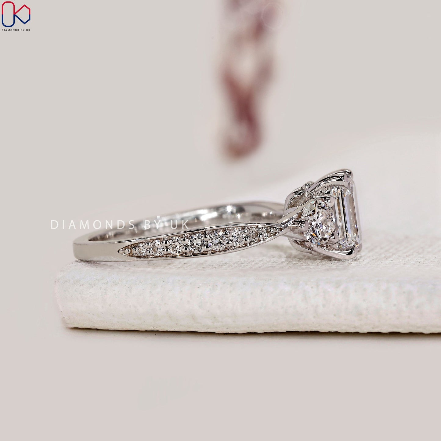 Emerald Cut Diamond Ring With Tapered Pave Band