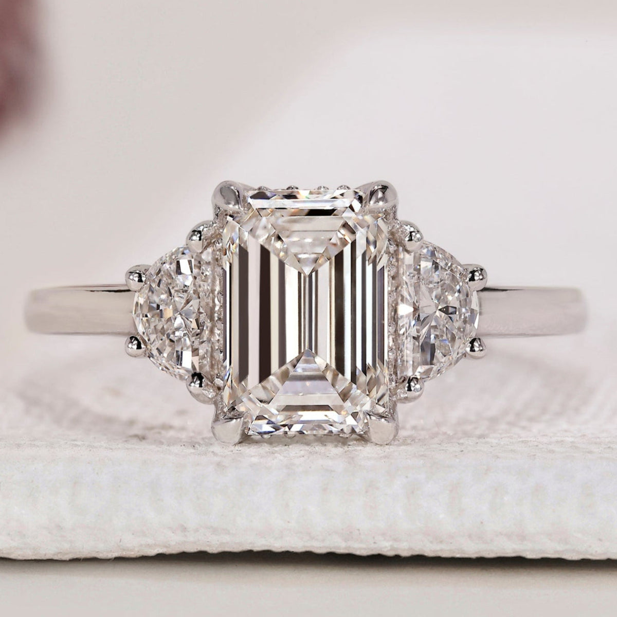 Emerald Cut 3 diamond engagement ring with Half Moon Sides