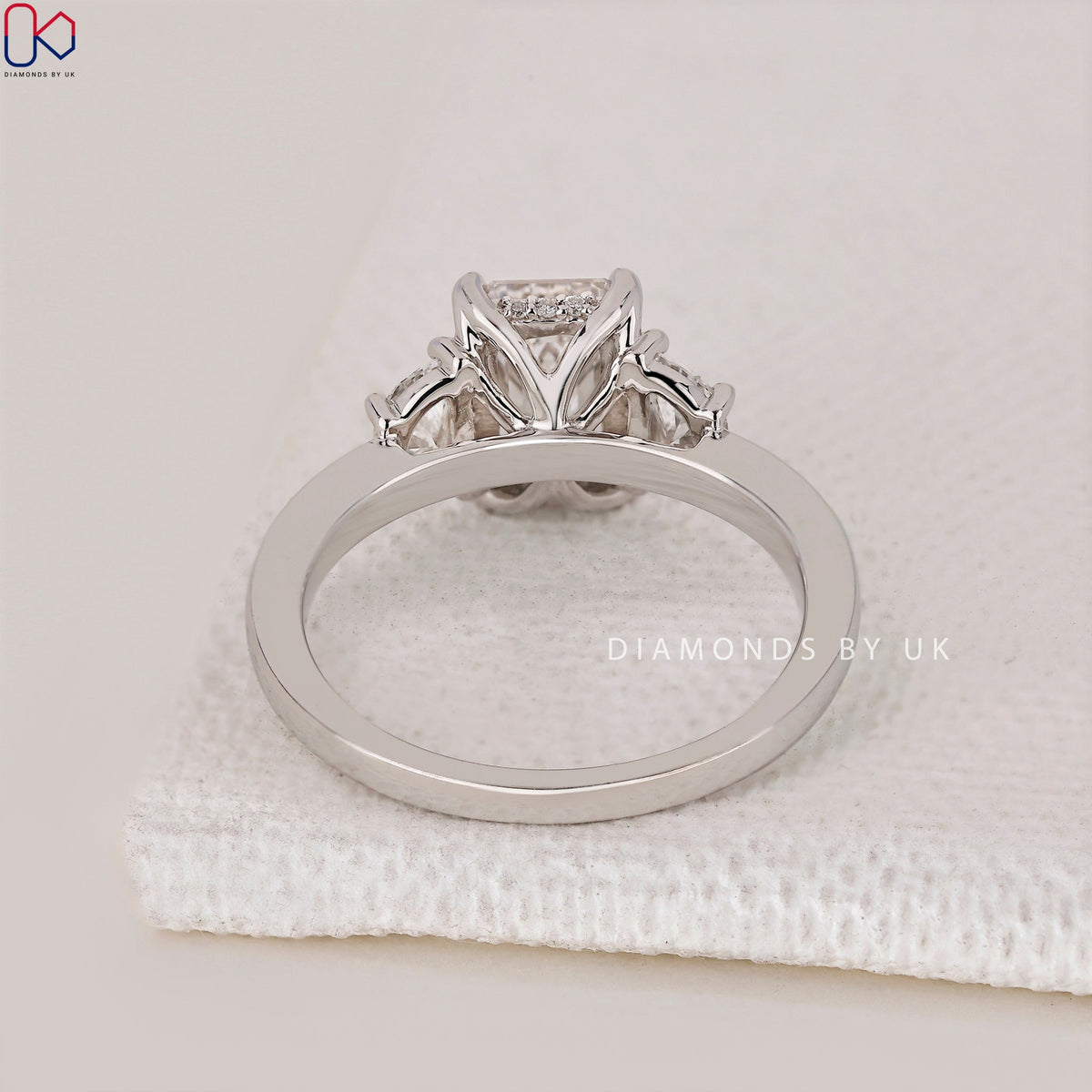 Emerald Cut 3 diamond engagement ring with Half Moon Sides